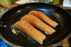 Pan fry salmon skin side down