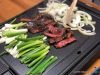 Korean BBQ Beef Bulgogi REcipe cooked on an electric table top grill