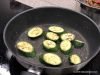 Charred courgettes on a dry pan