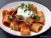 Paccheri pasta with tomato sauce and homemade stracciatella