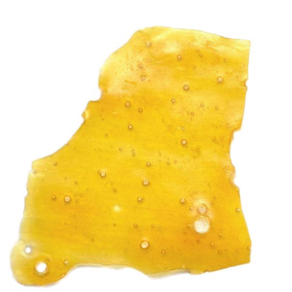 Skywalker OG Shatter showing glossy, amber-coloured cannabis extract