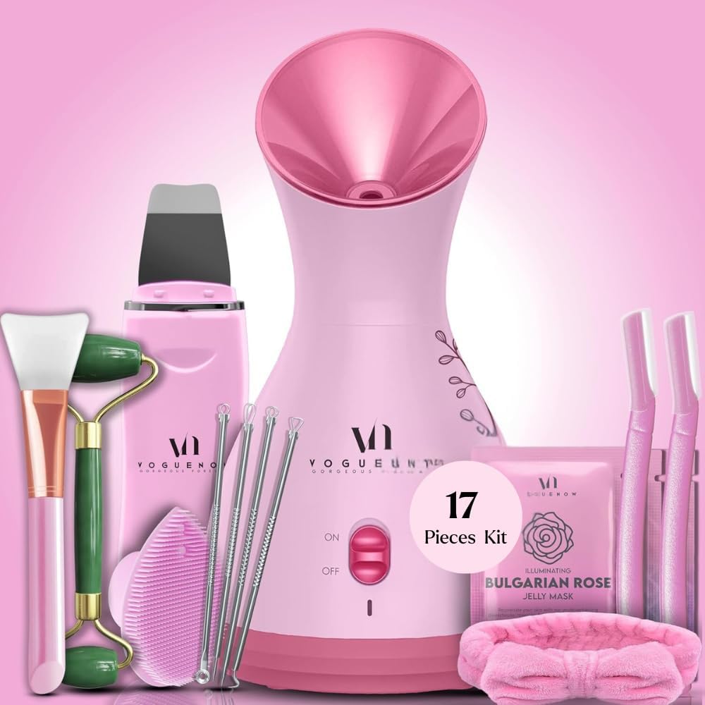 A pink 17-piece facial steamer spa kit featuring a facial steamer, jade roller, blackhead tools, silicone brush, headband, and Bulgarian Rose jelly mask.