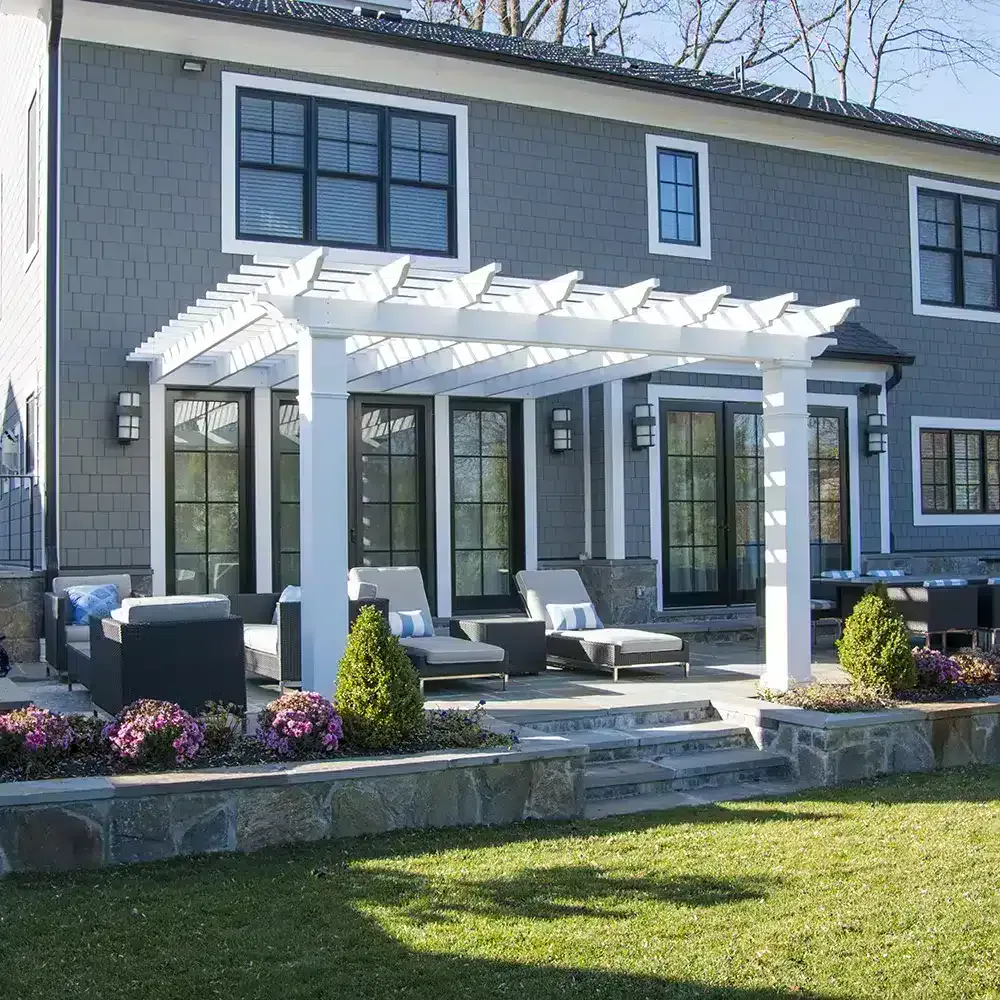 Williamsburg attached fiberglass pergola on stone patio