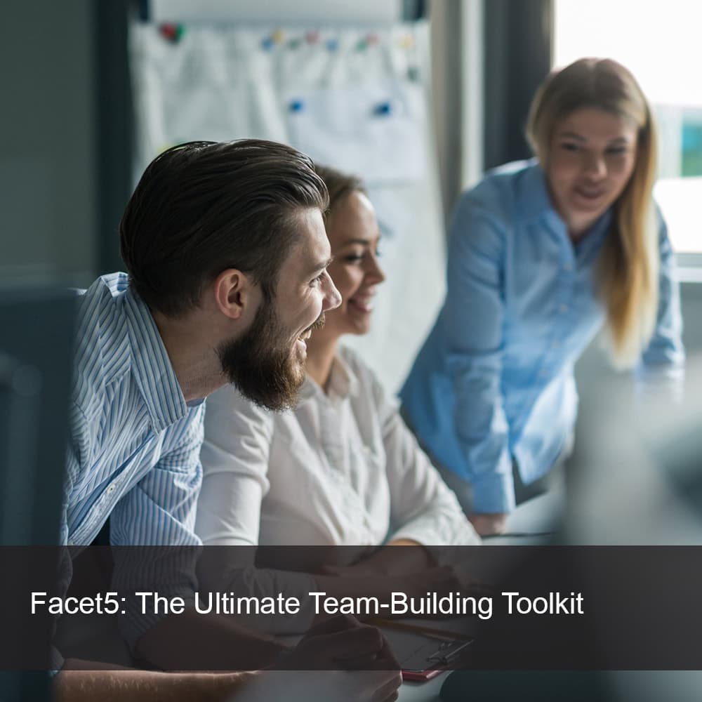 Smiling work colleagues during team building exercise