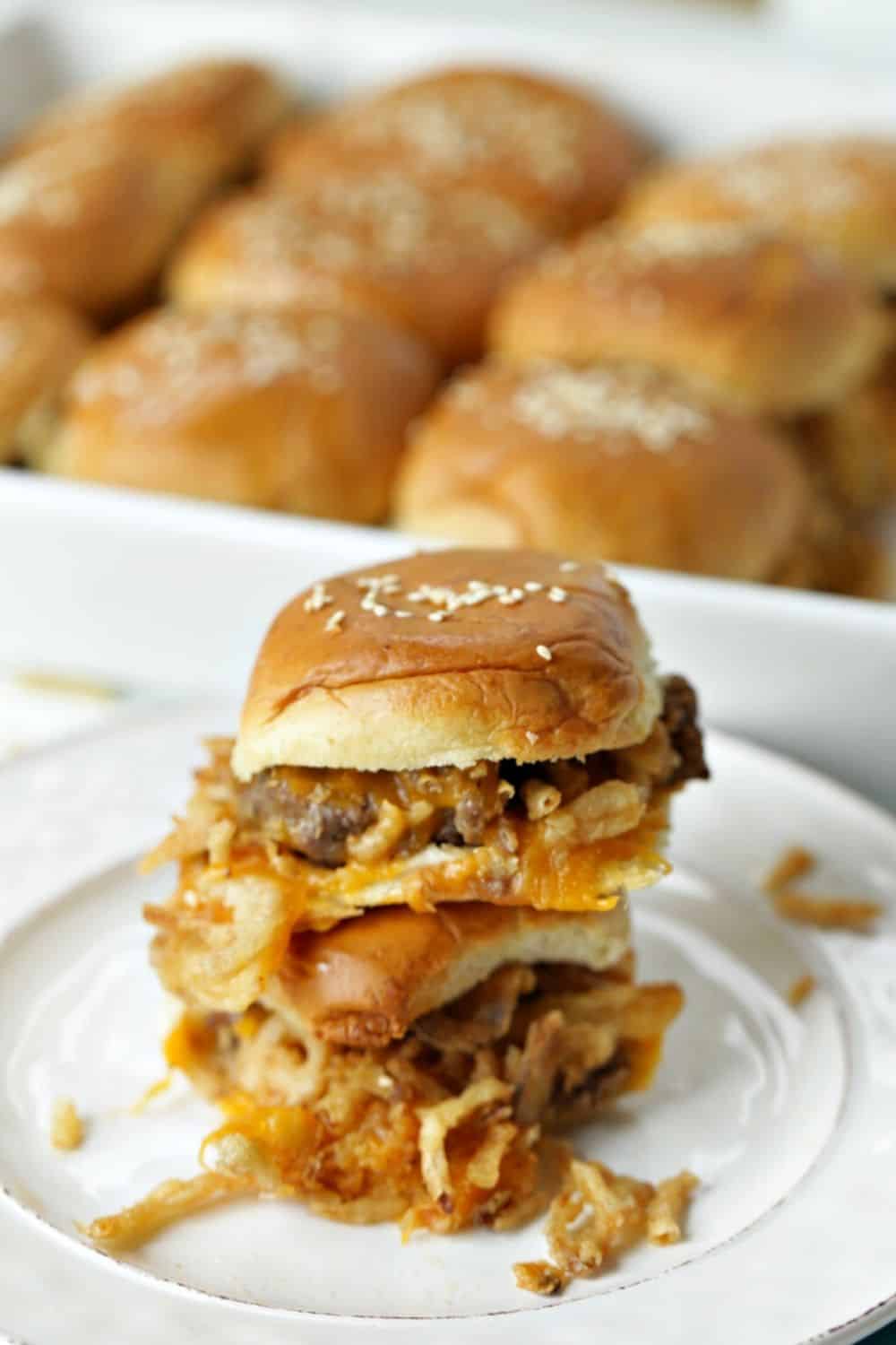 It's not a game day party without the food. These Cheeseburger Party Sliders are the perfect game day recipe. Score a touchdown with friends and family with this easy slider recipe. #Sliders #Cheeseburger #footballfood #GameDayRecipe #PartyRecipe #Superbowlrecipe