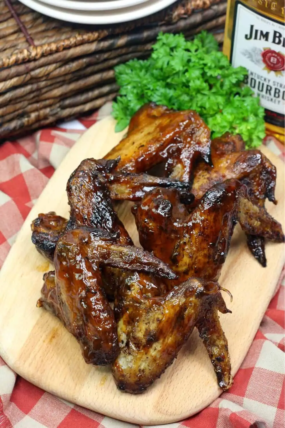 Wow your crowd at your next bbq or summer gathering. These Grilled Bourbon Chicken Wings are a deliciously simple grilled chicken recipe.  #wings #grilledchickenwings #wingrecipe #bbq