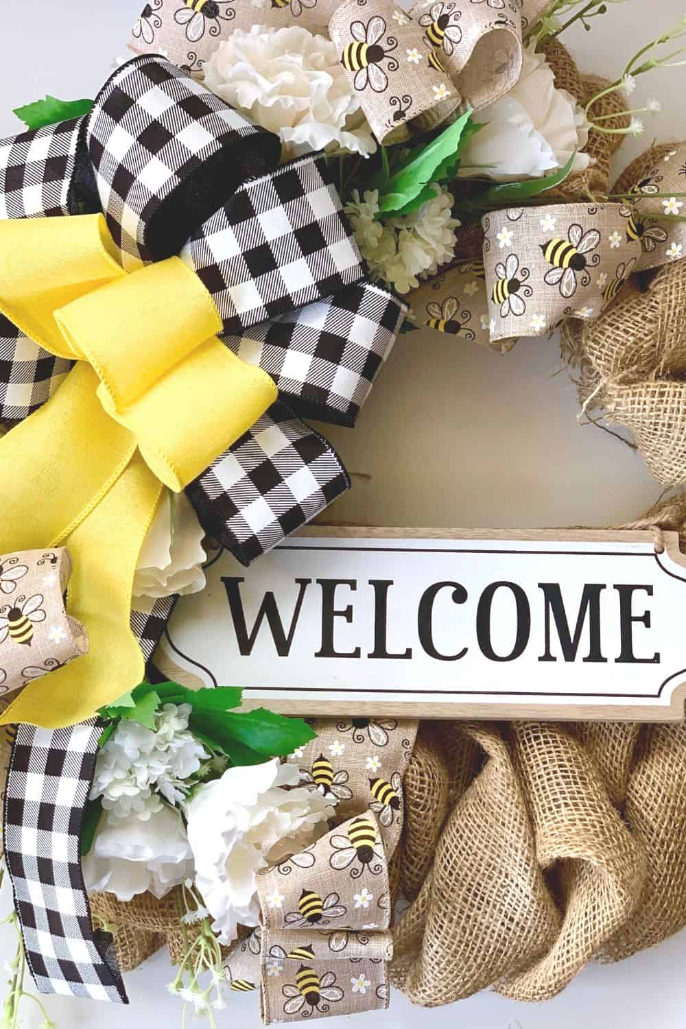 Add a welcoming touch of farmhouse style to your front door or entryway. This Rustic Farmhouse Welcome Wreath is an easy DIY project.