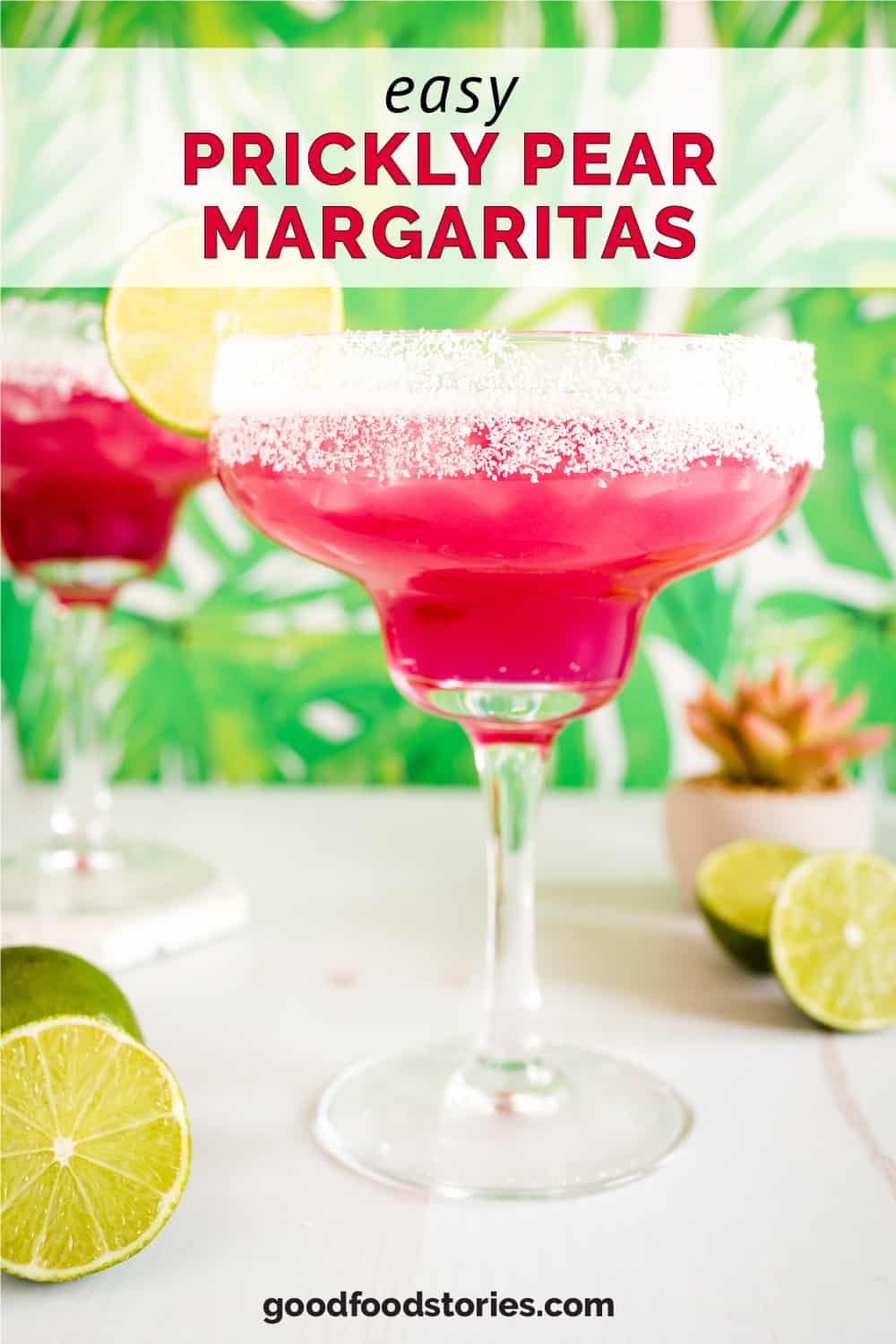 pink prickly pear margaritas surrounded by limes
