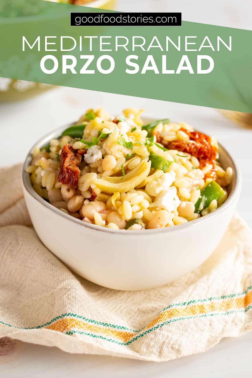 bowls of mediterranean orzo salad with green beans and sun-dried tomatoes
