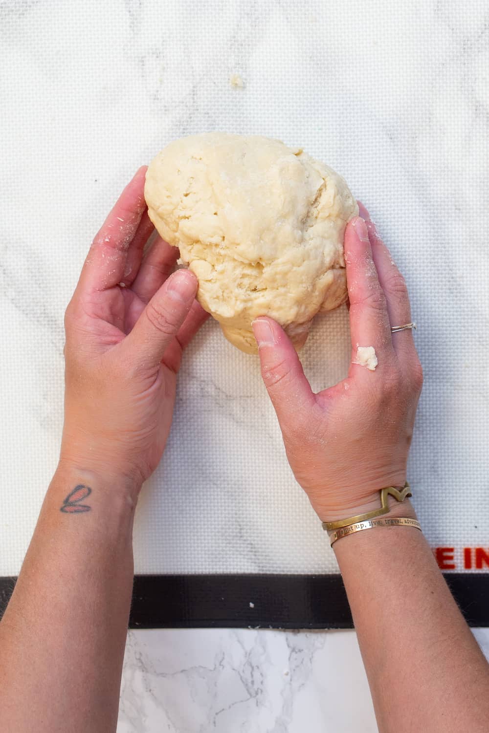 kneading pierogi dough