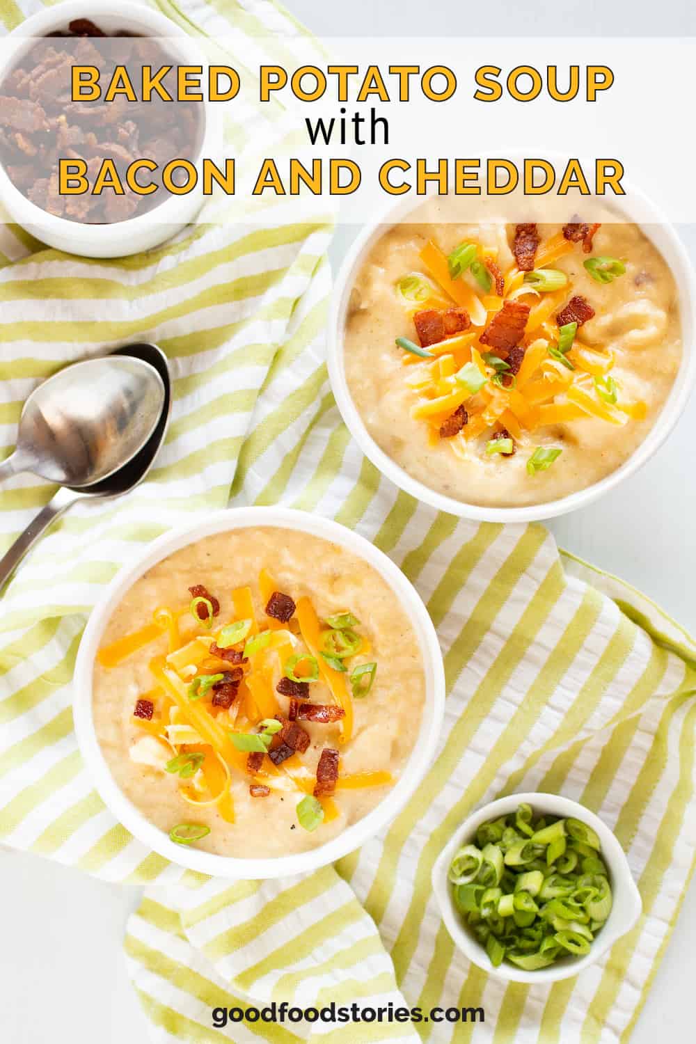 bowls of baked potato soup topped with cheddar, bacon and scallions