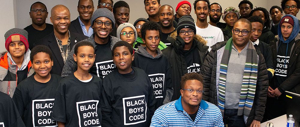A group picture of students and volunteers from a Black Boys Code Workshop at Ryerson University.