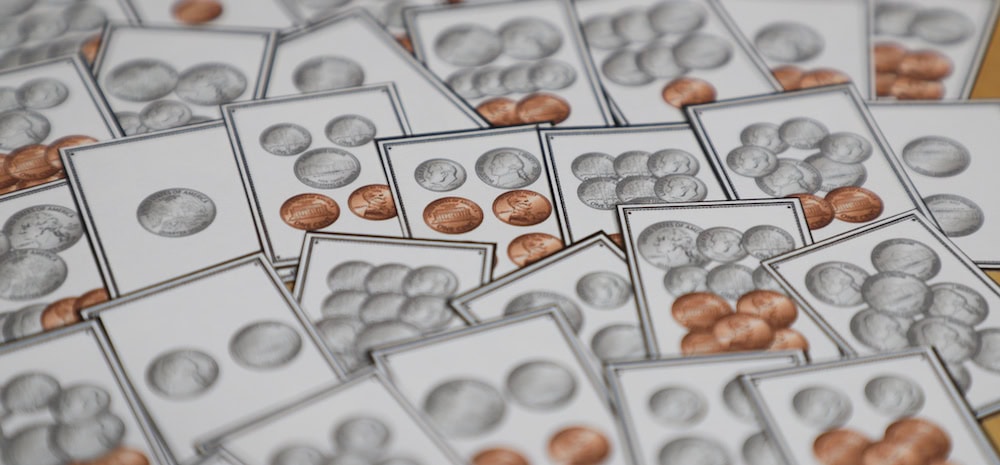 Photos of game cards with colored coins to make it easier for teaching money to kids.