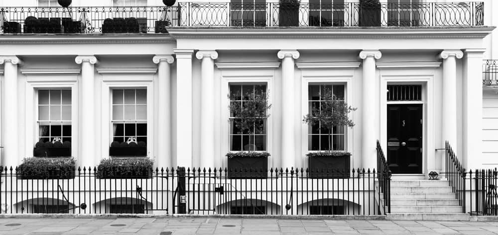 City town house with steps leading to front door