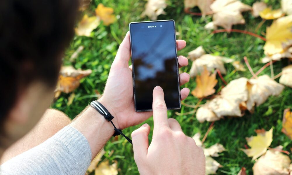 app hand mockup person. fake apps