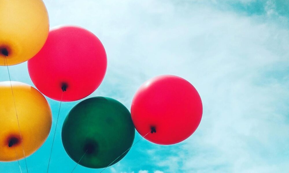 five assorted balloons