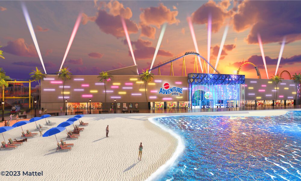 Construction workers building the Mattel Adventure Park in Arizona, with a glimpse of the Hot Wheels Bone Shaker Rollercoaster in progress