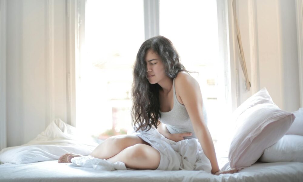 woman suffering from a stomach pain
