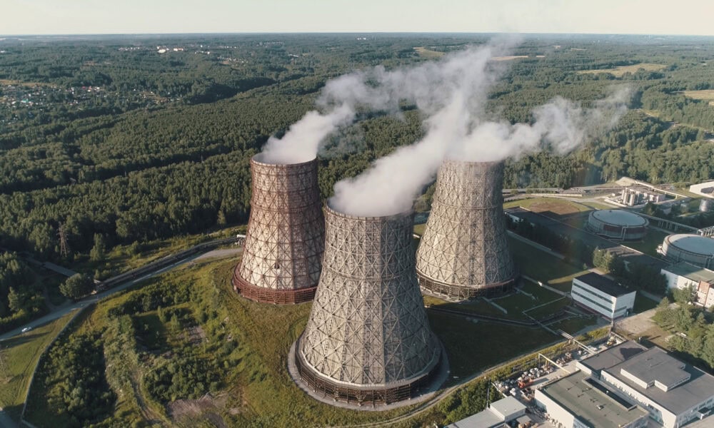 aerial view on the working power station cooling tower of nuclear power plant coal bur SBI 349994502