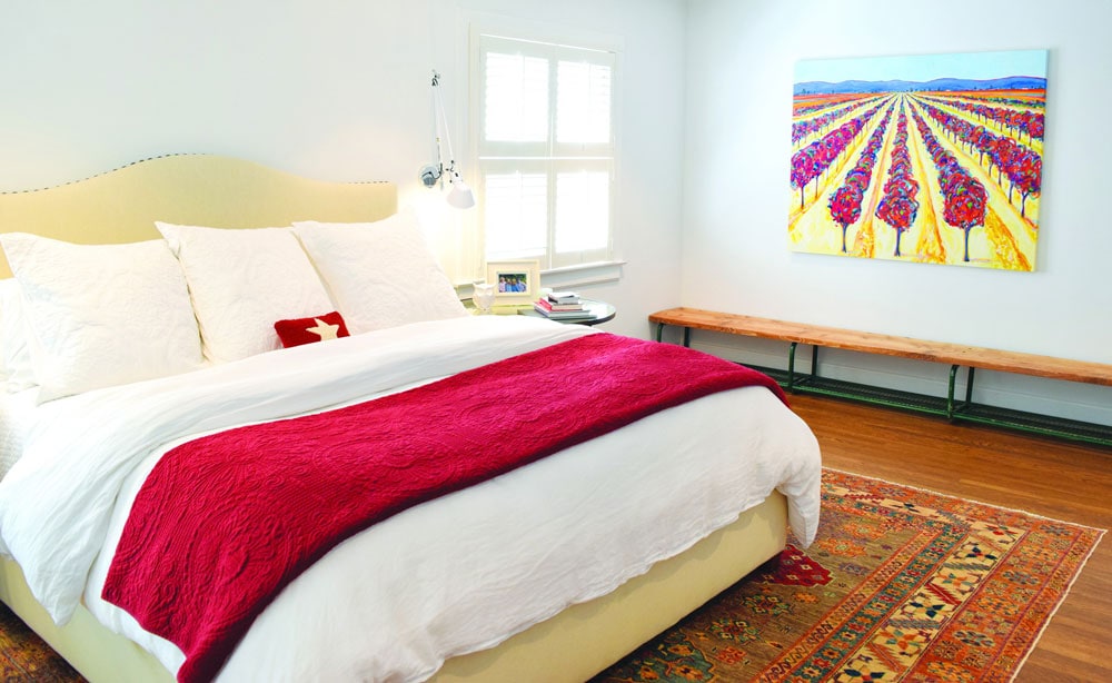 white bedroom with natural hardwood floors