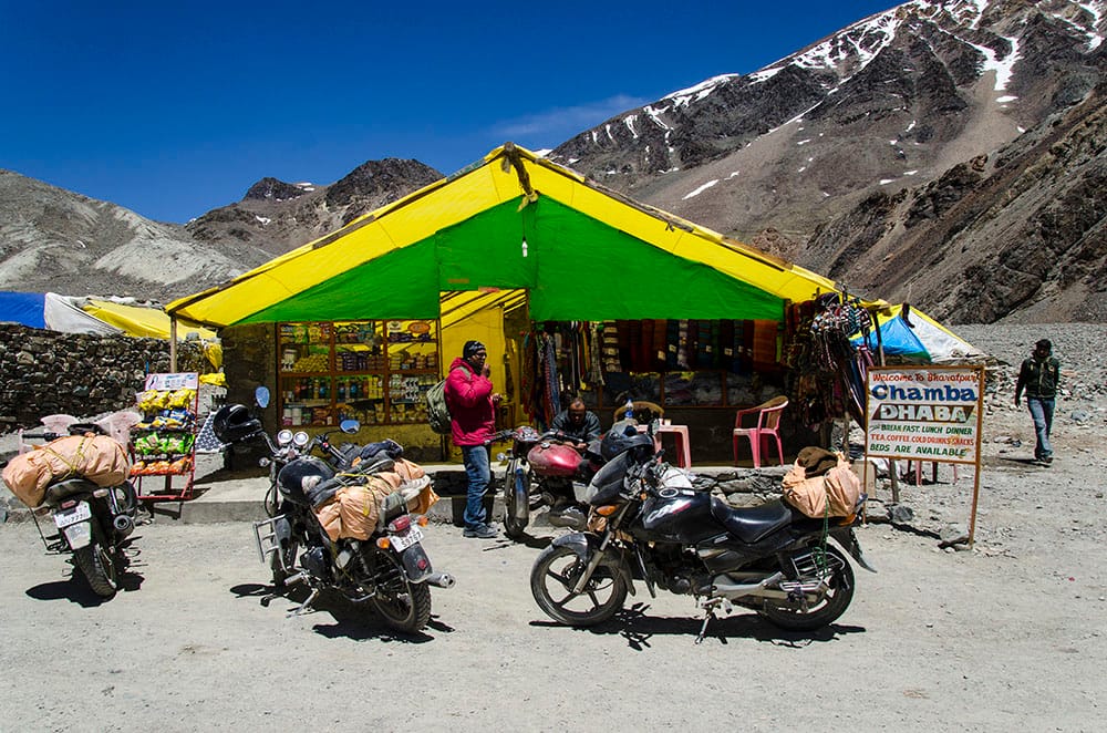Manali to Leh bike trip, Leh Ladakh bike trip, Himalayan bike adventure, Manali Leh highway, Rohtang Pass bike ride, Ladakh road trip, high altitude biking, AMS prevention tips, bike rental Manali, Leh Ladakh tour, best route Manali to Leh, adventure biking in India, Ladakh travel guide, Himalayan Rider tour, Manali to Leh fuel stops, Ladakh accommodation options, extreme terrain biking, mountain pass road trip, Leh Ladakh tourism, best time for Manali Leh ride