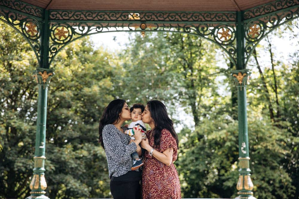 sisters and baby during a photoshoot photographer in manchester
