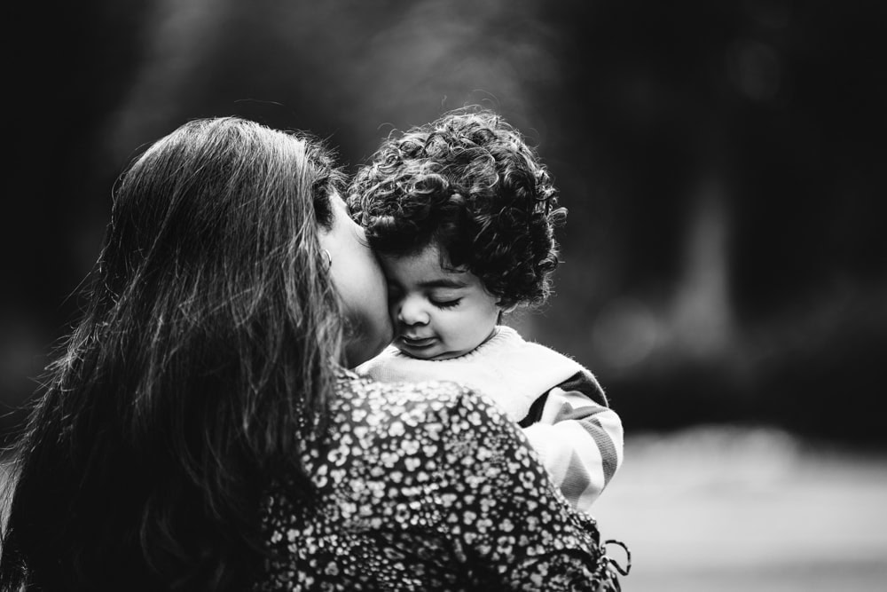 a mother and son moment during a family photoshoot in hyde park