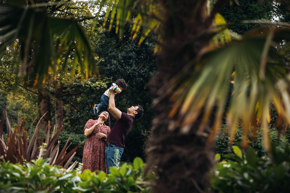 stockport family photographer with a family in hyde park