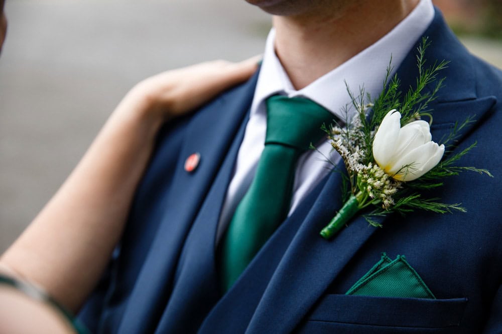 wedding details of grooms flowers