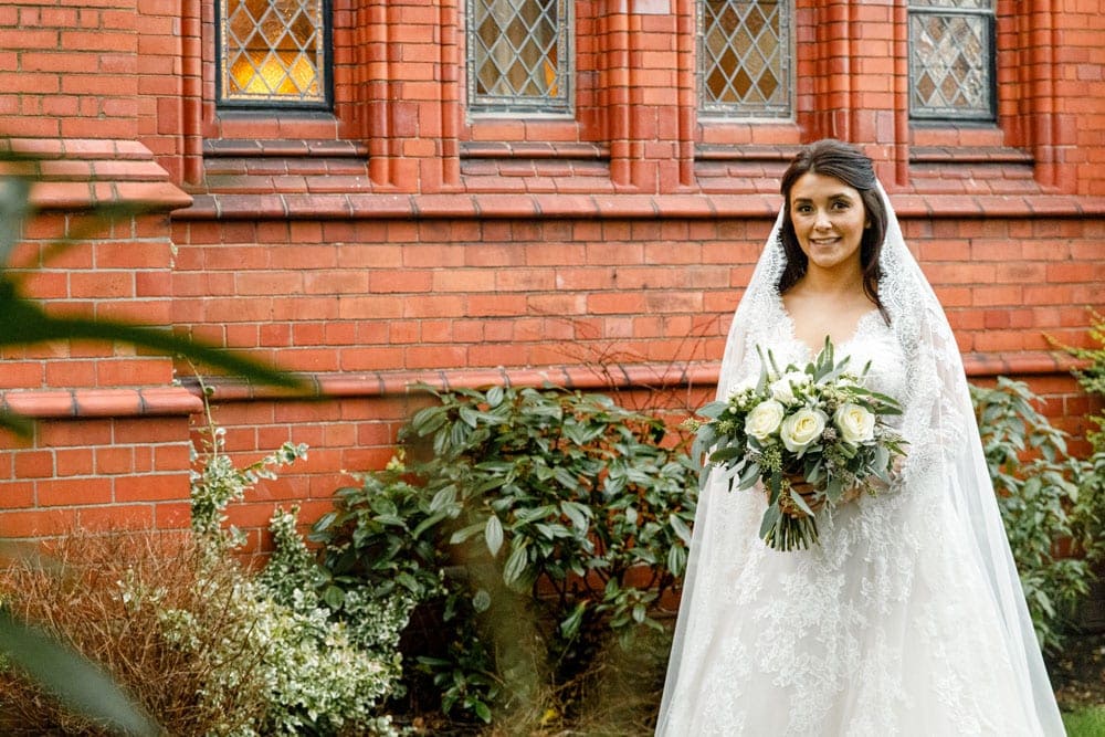 bride and groom portraits at st vincent church altrincham