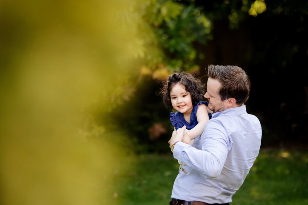 Family photography session in bowden in the back garden of a family home