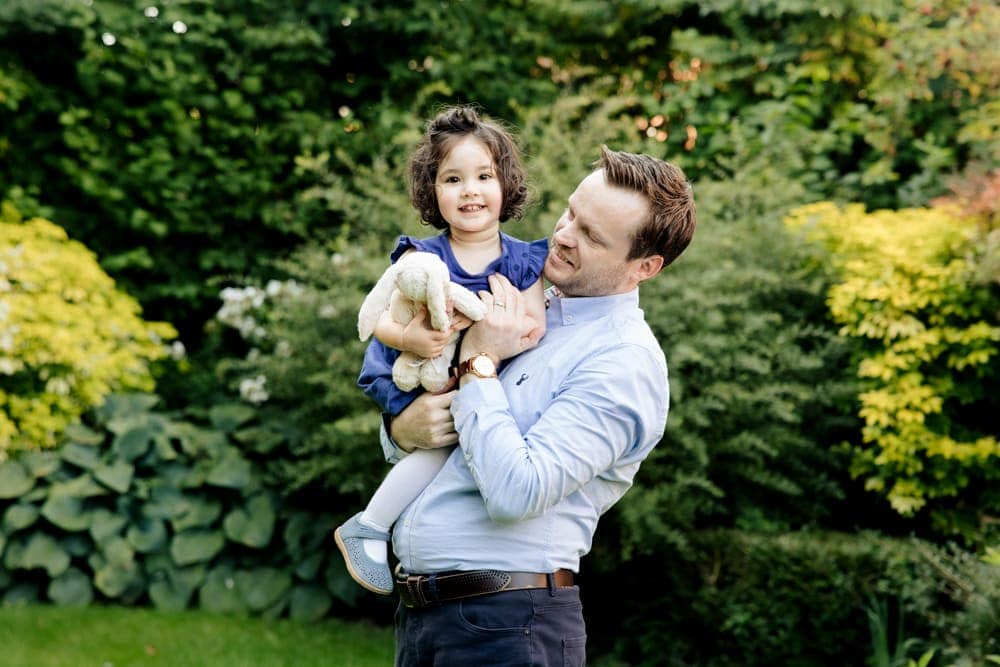 Family photography session in bowden in the back garden of a family home