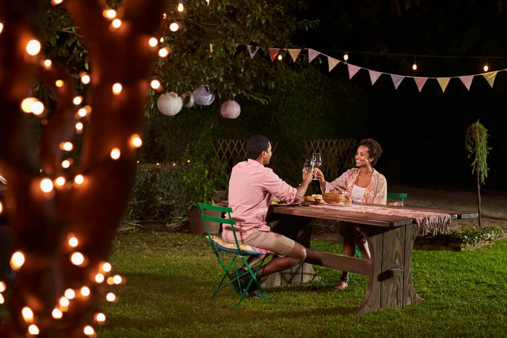 Lighting sets the mood in a romantic garden