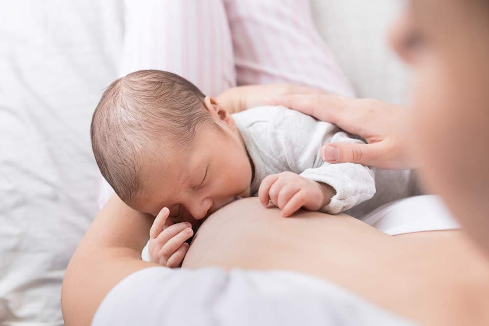 Mama Linc Mother Breastfeeding Baby After Giving Birth