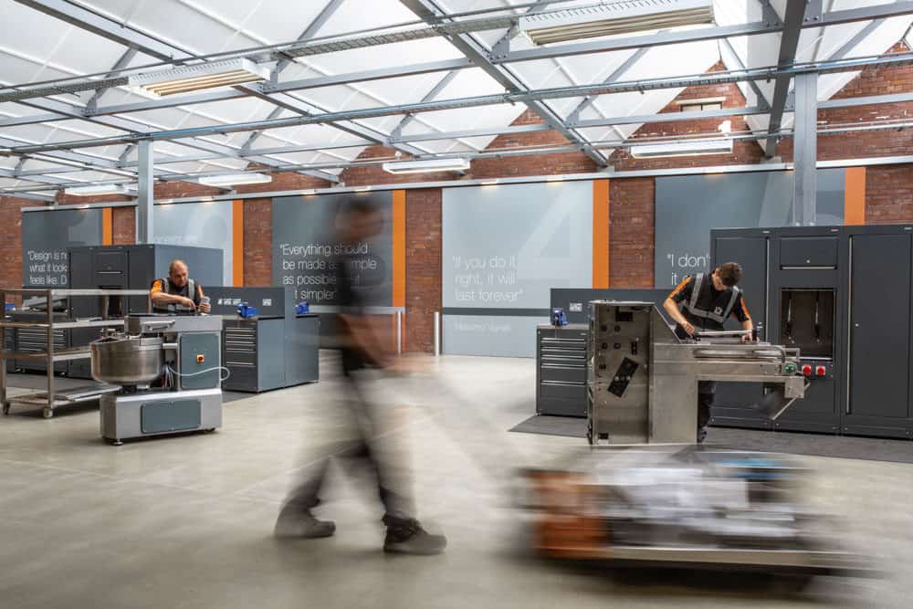 Photograph of a warehouse in bury manchester on a busy day showing the production process by er event photography