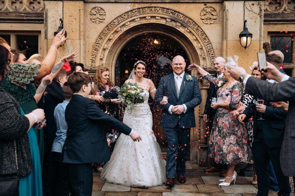 bride and groom confetti photo at soughton hall