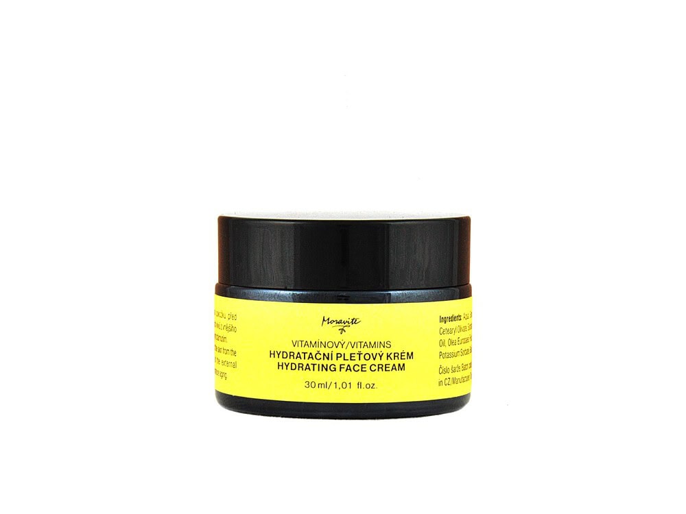 Černá dóza s vitamínovým hydratačním pleťovým krémem Moravité, žlutá etiketa s nápisem Hydrating Face Cream, 30 ml.