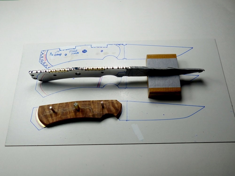 12 Top view of partially assembled knife and working drawing Top view of partially assembled knife and working drawing