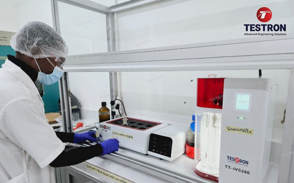 Lab technician checking samples with TT-IVS200 Intrinsic Viscosity Tester at RAGEC Congo
