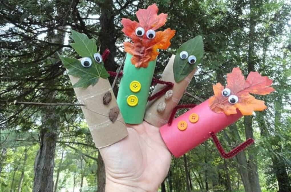 finger puppets autumn themed craft using natural leaves