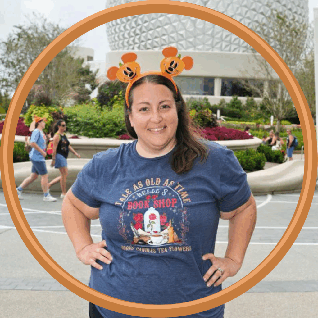 Cute woman wearing Mickey Mouse ears at Epcot, Disney World, must-have Disney vacation experience.
