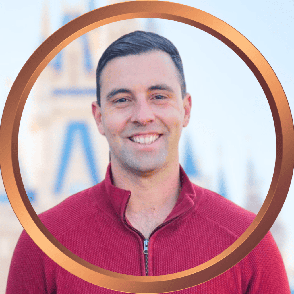 Friendly traveler in front of iconic Orlando landmark, representing expert vacation planning services.