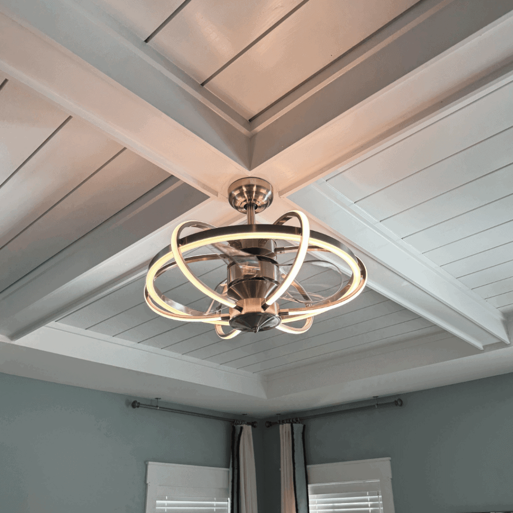 A Fandelier with clear fan blades, so that the ceiling fan looks like a chandelier