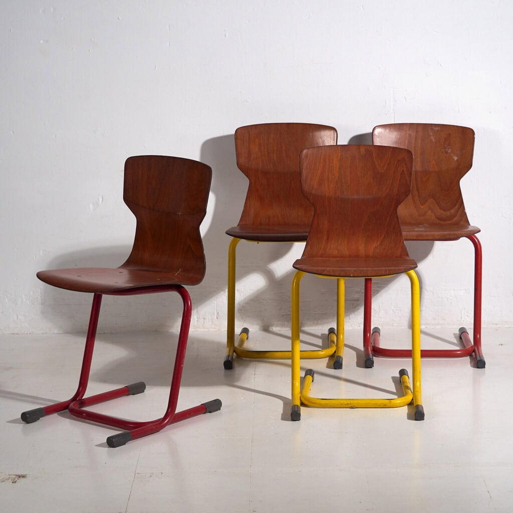 Industrial lounge chairs in yellow and red (c.1950). Set of 4 pieces