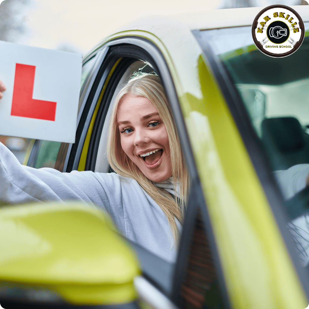 A woman proudly displays a driving test sign, symbolizing her readiness to take the driving examination.