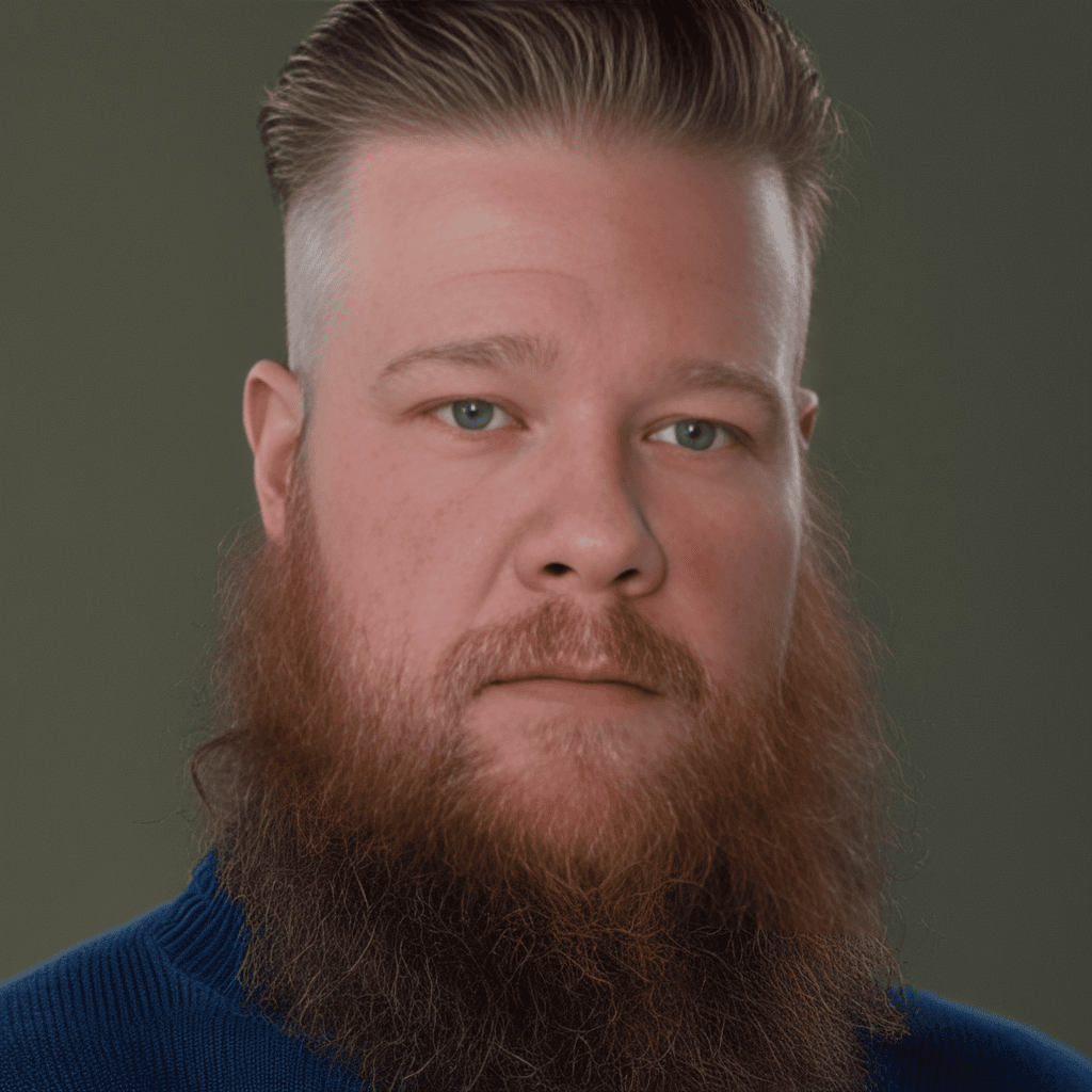 A headshot of Kevin Duska Jr. with a large beard