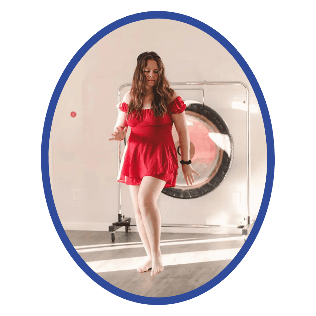 photo by madre tierra wellness farm Meditative woman in red dress practicing mindfulness in wellness center, yoga and relaxation, holistic healing, calm mind, spiritual well-being, soulstice living, self-care, inner peace, soul-centered lifestyle, mental health awareness.