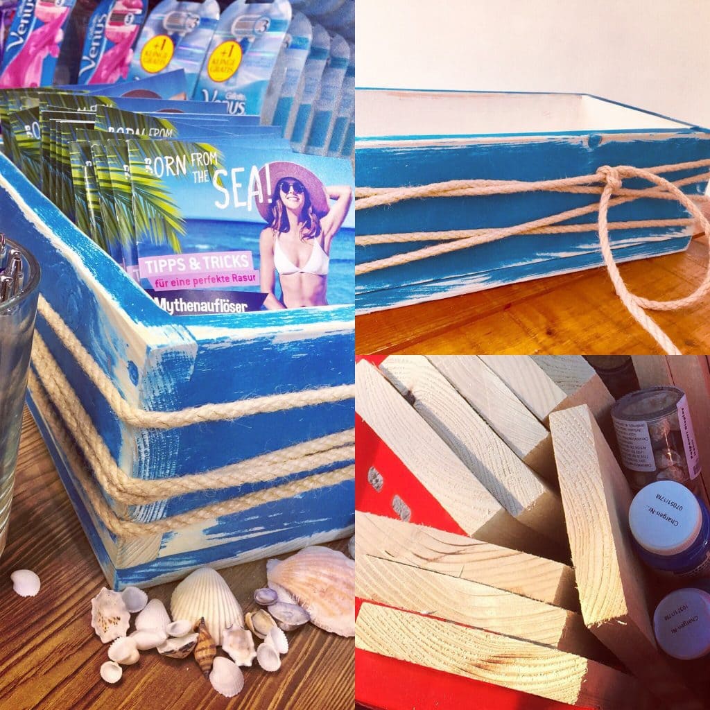 Foto einer Holzkiste mit Flyern auf der Messe Glow