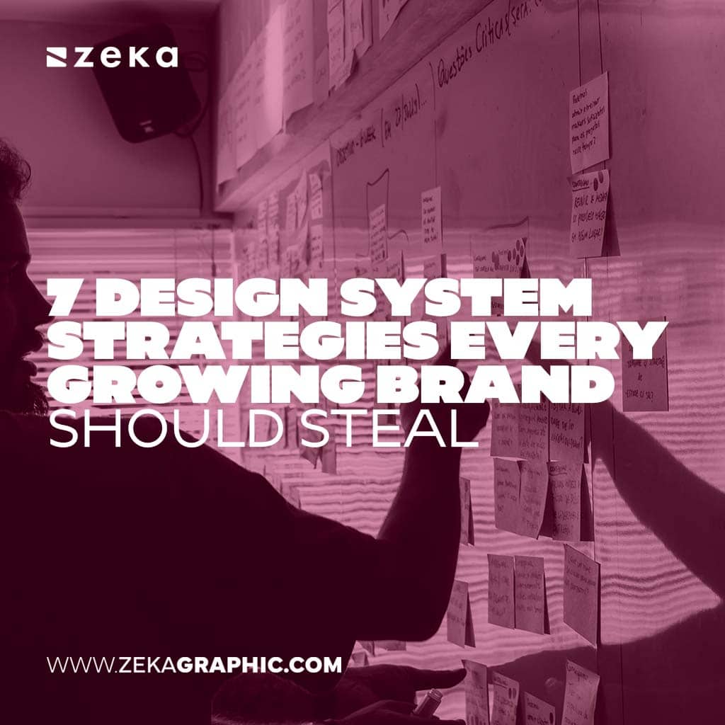 Pink duotone image of a person pointing at a wall covered in sticky notes during a brainstorming session, with bold white text reading 7 Design System Strategies Every Growing Brand Should Steal.