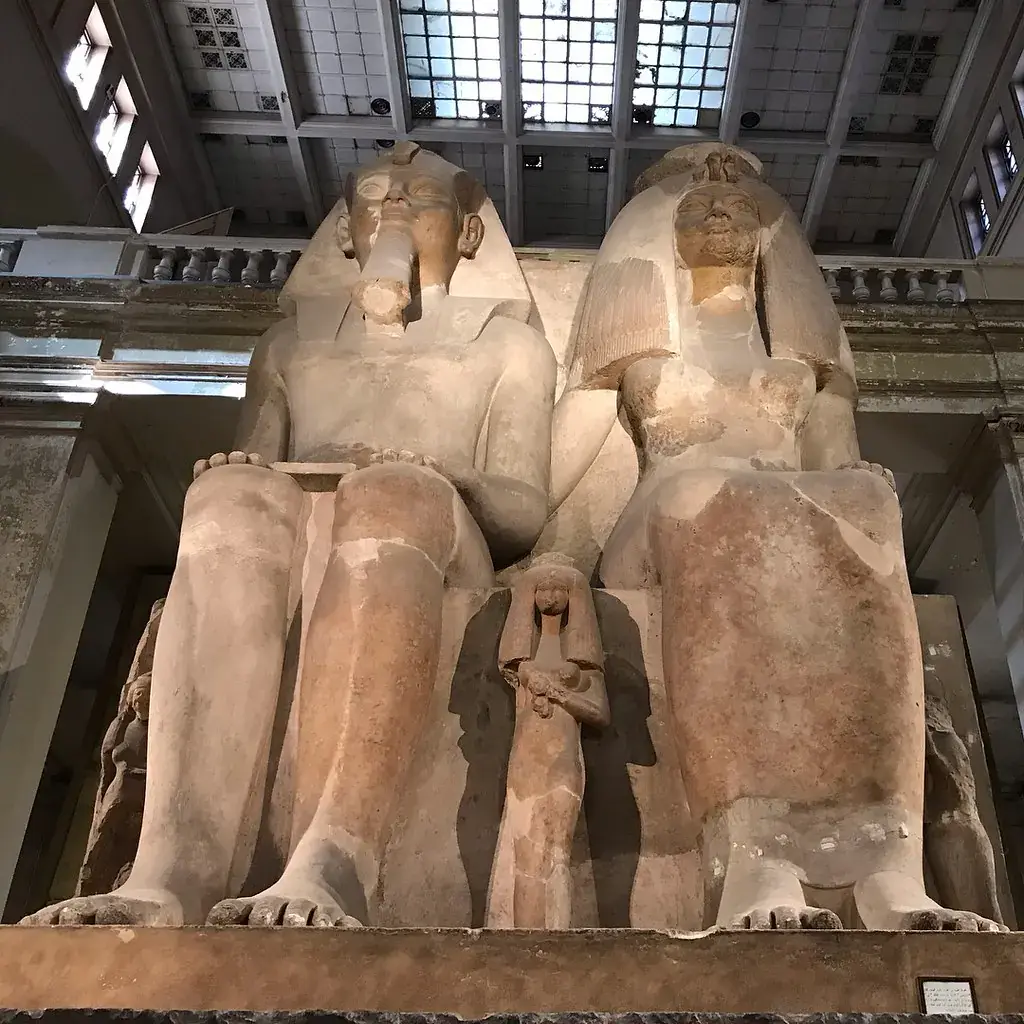 Colossal family statue of Amenhotep III and Queen Tiye